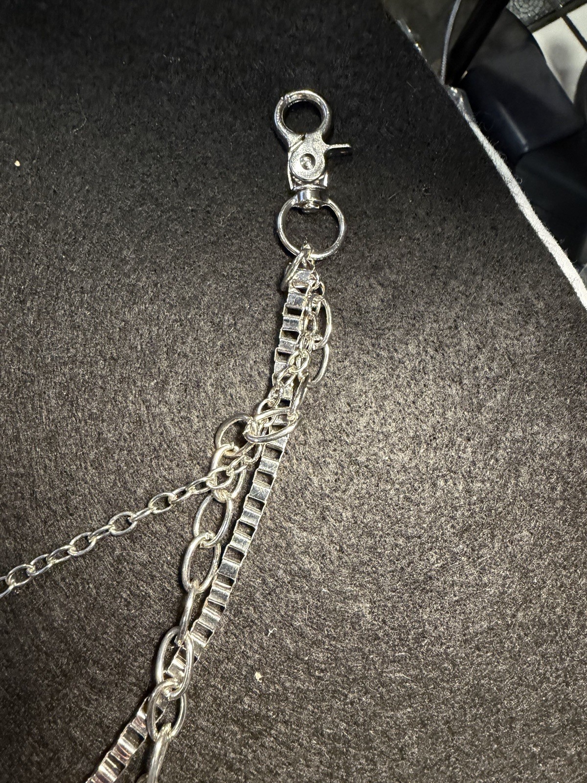 silver pant or wallet chain, a popular item in punk, gothic, and hip-hop fashion